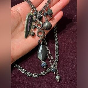Long Statement Necklace with Dangle Fringe Detail Black Purple Feather
